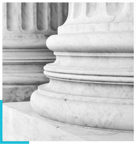 A close up of pillars in the middle of a building